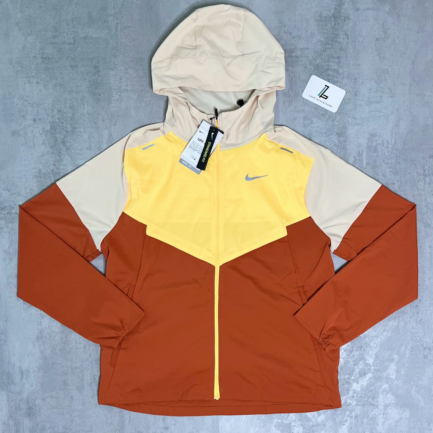 NIKE UV WINDBREAKER ‘YELLOW/RUST’
