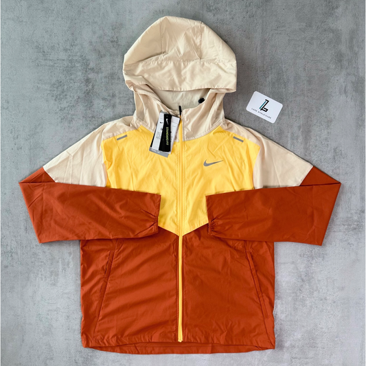 NIKE UV WINDBREAKER ‘YELLOW/RUST’